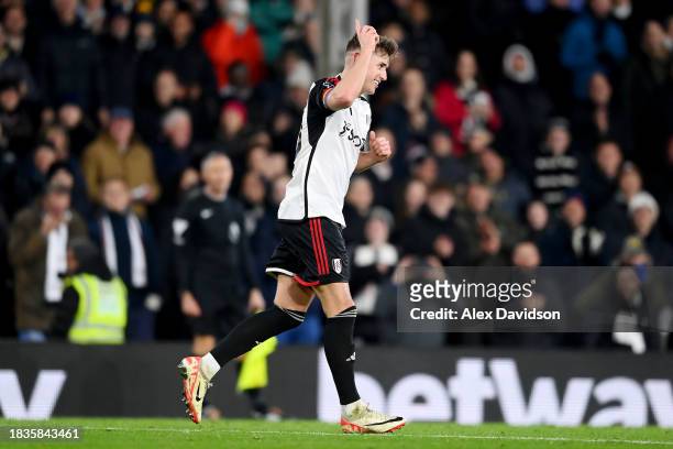Tom Cairney of Fulham celebrates scoring his team's fifth goal during the Premier League match between Fulham FC and Nottingham Forest at Craven...