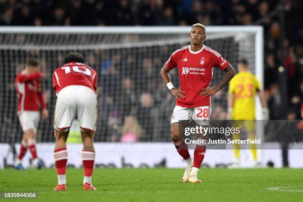 Danilo of Nottingham Forest looks dejected after Tom Cairney of Fulham scores his team's fifth goal during the Premier League match between Fulham FC...