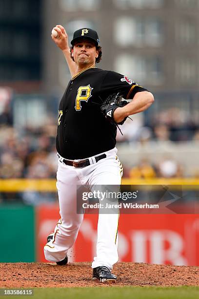 Vin Mazzaro of the Pittsburgh Pirates throws a pitch in the sixth inning against the St. Louis Cardinals during Game Four of the National League...