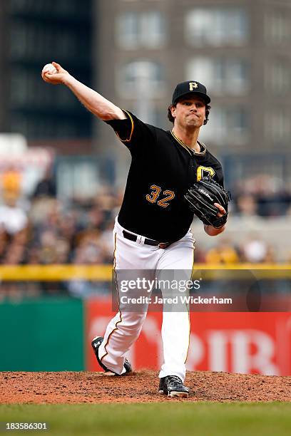 Vin Mazzaro of the Pittsburgh Pirates throws a pitch against the St. Louis Cardinals during Game Four of the National League Division Series at PNC...