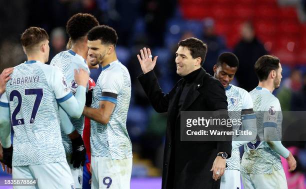 Andoni Iraola, Manager of AFC Bournemouth, interacts with his players at full-time following the team's victory in the Premier League match between...