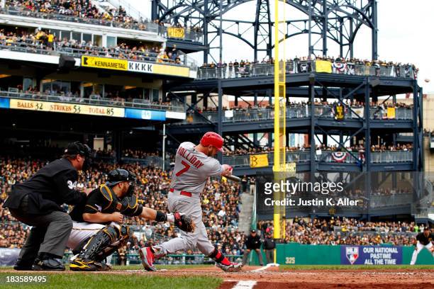 Matt Holliday of the St. Louis Cardinals hits a two run home run against Charlie Morton of the Pittsburgh Pirates in the sixth inning during Game...