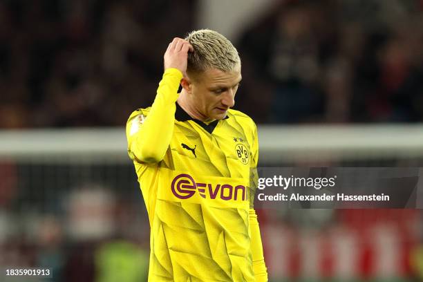 Marco Reus of Borussia Dortmund looks dejected after the team's defeat in the DFB cup round of 16 match between VfB Stuttgart and Borussia Dortmund...
