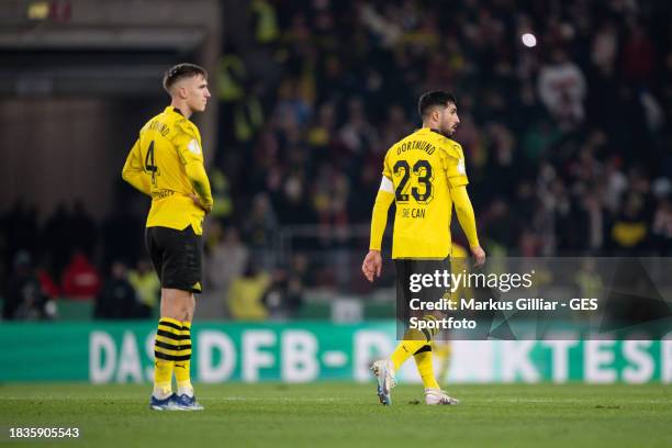 Nico Schlotterbeck and Emre Can of Dortmund look dejected after the DFB cup round of 16 match between VfB Stuttgart and Borussia Dortmund at MHPArena...