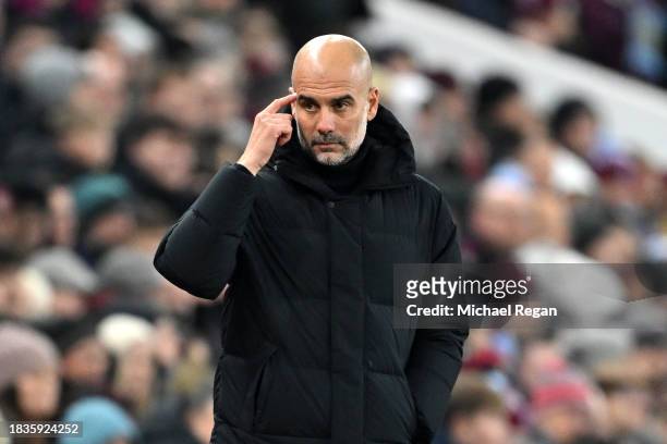 Pep Guardiola, Manager of Manchester City, gestures during the Premier League match between Aston Villa and Manchester City at Villa Park on December...