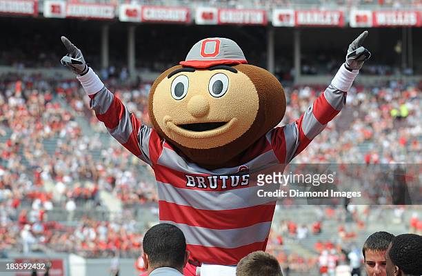 Mascot Brutus the Buckeye celebrates after a Ohio State touchdown during a game against the Buffalo Bulls at Ohio Stadium in Columbus, Ohio. The Ohio...