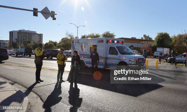 An ambulance leaves on Maryland Parkway on the east side of the UNLV campus after a shooting on December 06, 2023 in Las Vegas, Nevada. According to...