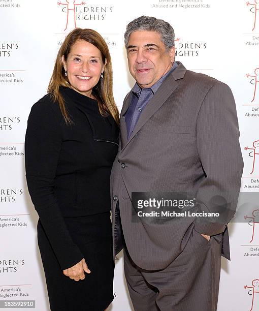 Actress Lorraine Bracco and actor Vincent Pastore attend 8th Annual Children's Rights Benefit at Four Seasons Restaurant New York on October 7, 2013...