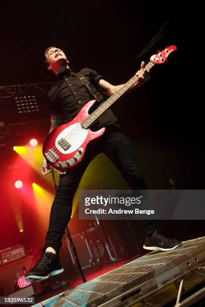 Justin Hills of Sleeping With Sirens performs on stage at Manchester Academy on October 7, 2013 in Manchester, England.