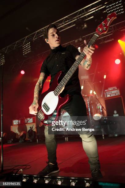 Justin Hills of Sleeping With Sirens performs on stage at Manchester Academy on October 7, 2013 in Manchester, England.