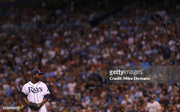 Fernando Rodney of the Tampa Bay Rays pitches in the ninth inning against the Boston Red Sox during Game Three of the American League Division Series...