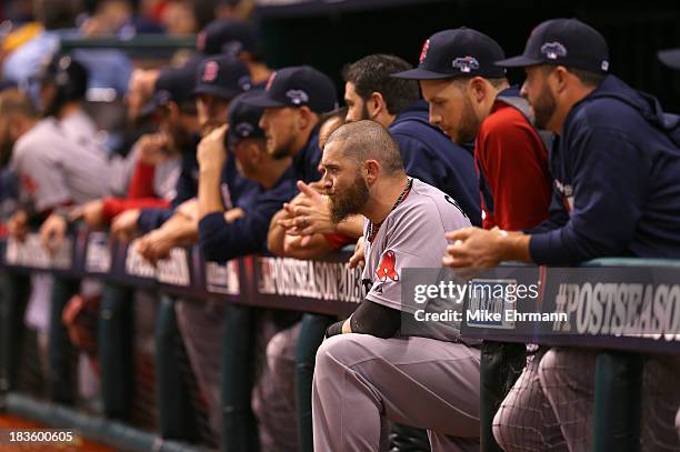 Jonny Gomes of the Boston Red Sox looks on from the dugout in the ninth inning against the Tampa Bay Rays during Game Three of the American League...