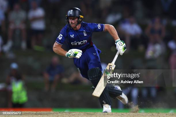 Jos Buttler of England turns for a second run during the 2nd CG United One Day International match between West Indies and England at Sir Vivian...