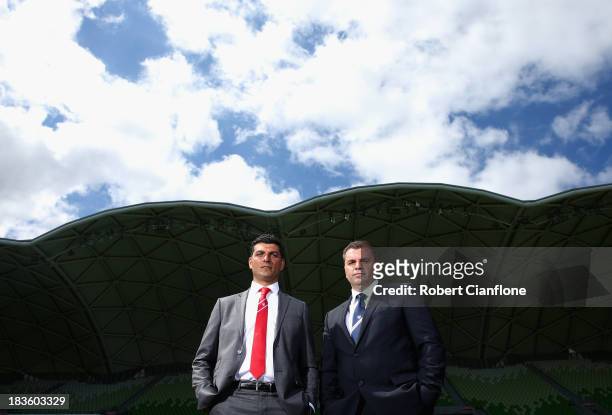 Melbourne Heart Coach John Aloisi and Melbourne Victory coach Ange Postecoglou pose after the 2013/14 A-League Season Launch at AMMI Park on October...