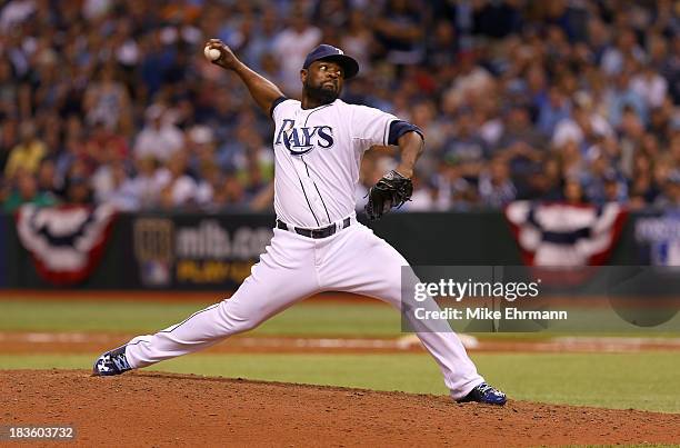 Fernando Rodney of the Tampa Bay Rays pitches in the ninth inning against the Boston Red Sox during Game Three of the American League Division Series...