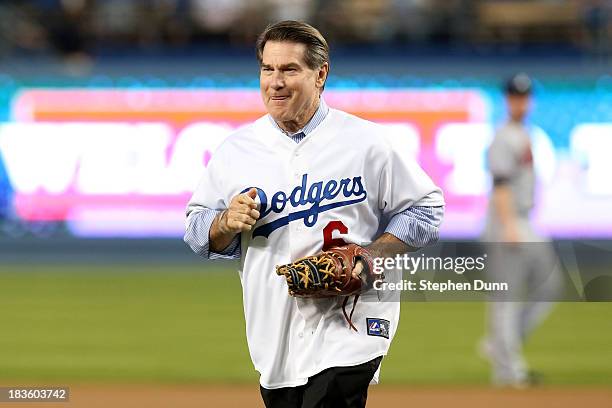 Los Angeles Dodgers legend Steve Garvey throws out a ceremonial first pitch before the Dodgers take on the Atlanta Braves in Game Four of the...