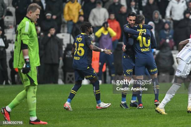 Dusan Tadic and Rodrigues of Fenerbahce celebrate after scoring a goal during the Turkish Super Lig week 15 match between Besiktas and Fenerbahce at...