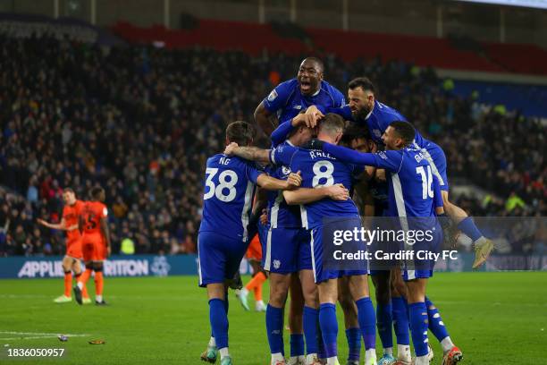 The Cardiff players celebrate the teams first goal against Millwall during the Sky Bet Championship match between Cardiff City and Millwall at...