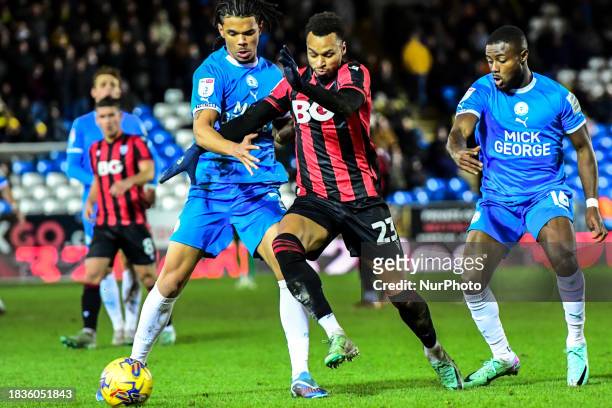 Josh Murphy of Oxford United is being challenged by Jadel Katongo of Peterborough United during the Sky Bet League 1 match between Peterborough and...