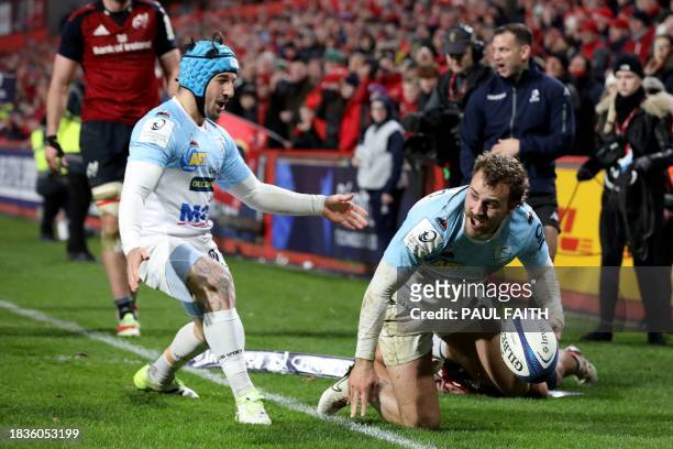 Bayonne's French left-wing Remy Baget celebrates after scoring a try during the European Champions Cup pool 3 rugby union match between Munster and...