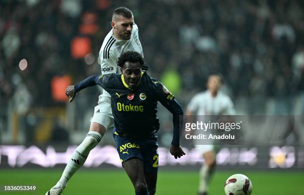 Rebic of Besiktas and Samuel of Fenerbahce compete during the Turkish Super Lig week 15 match between Besiktas and Fenerbahce at Tupras Stadium in...