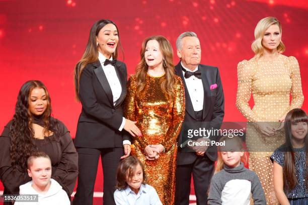 Verona Pooth , Vicky Leandros, Roland Kaiser and Michelle Hunziker on stage at the beginning the "Ein Herz fuer Kinder" charity gala at Studio Berlin...