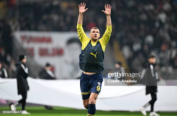 Edin Dzeko of Fenerbahce greets the fans ahead of the Turkish Super Lig week 15 match between Besiktas and Fenerbahce at Tupras Stadium in Istanbul,...