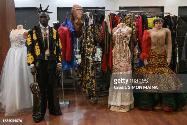 Fashion designer Morgan Azedy of raw collections poses during the Africa Fashion Week, at the delight technical college in Nairobi on December 9,...
