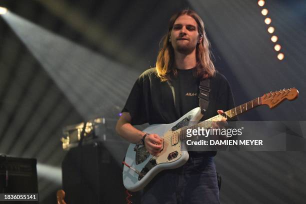 Post Nebbia band Italian singer Carlo Corbellini performs on stage during the "Les Trans Musicales" music festival in Rennes, western France on...