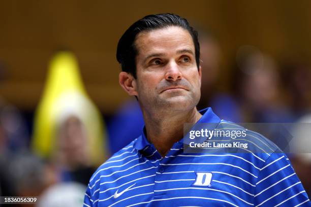 Duke head football coach Manny Diaz attends the game between the Charlotte 49ers and the Duke Blue Devils at Cameron Indoor Stadium on December 9,...