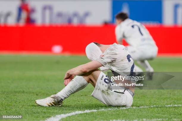 Dmitry Tikhy and Nikolay Kalinsky of Pari Nizhny Novgorod react after the Russian Premier League match between FC Zenit Saint Petersburg and FC Pari...