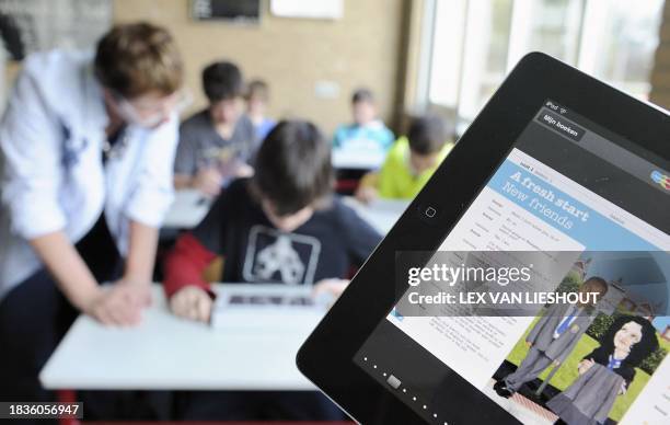Students of the Hondsrug college use Ipads during an English class in Emmen on April 18, 2011. After summer holidays, every class of Hondsrug college...