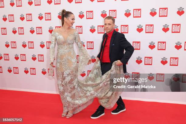 Alessandra Meyer-Wölden and Oliver Pocher attend the Ein Herz Fuer Kinder Gala 2023 at Studio Berlin Adlershof on December 9, 2023 in Berlin, Germany.