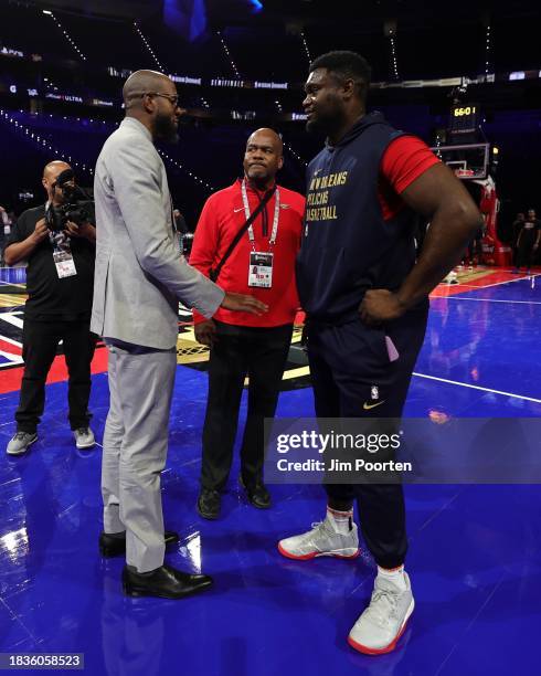 Legend Andre Iguodala and Zion Williamson of the New Orleans Pelicans talk before the game against the Los Angeles Lakers during the semifinals of...