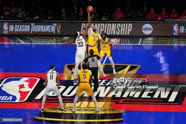 Myles Turner of the Indiana Pacers goes against Anthony Davis of the Los Angeles Lakers for the tip-off during the In-Season Tournament Championship...