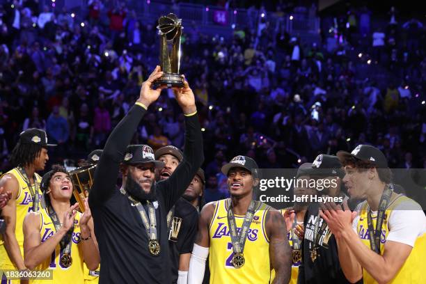 LeBron James of the Los Angeles Lakers celebrates with In-Season Tournament MVP trophy after winning the In-Season Tournament Championship game...