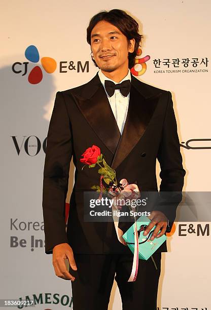 Kim Min-Jun arrives for APAN Star Road during the 18th Busan International Film Festival at the Haeundae Beach BIFF Village on October 4, 2013 in...