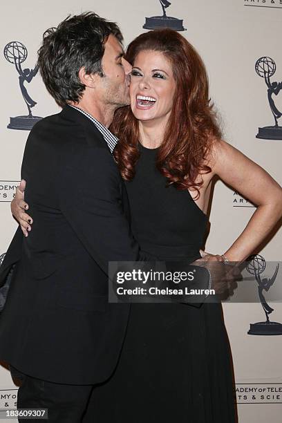 Actors Eric Mccormack and Debra Messing arrive at "An Evening Honoring James Burrows" at Academy of Television Arts & Sciences on October 7, 2013 in...