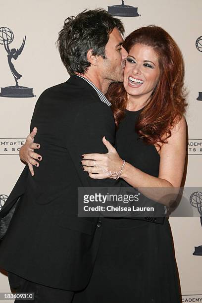 Actors Eric Mccormack and Debra Messing arrive at "An Evening Honoring James Burrows" at Academy of Television Arts & Sciences on October 7, 2013 in...