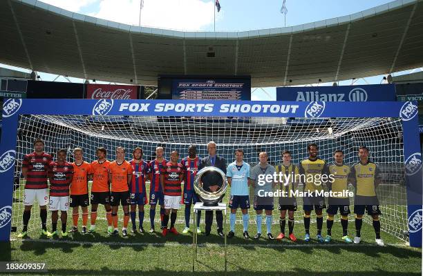 League CEO David Gallop poses with players during the 2013/14 A-League Season Launch at Allianz Stadium on October 8, 2013 in Sydney, Australia.