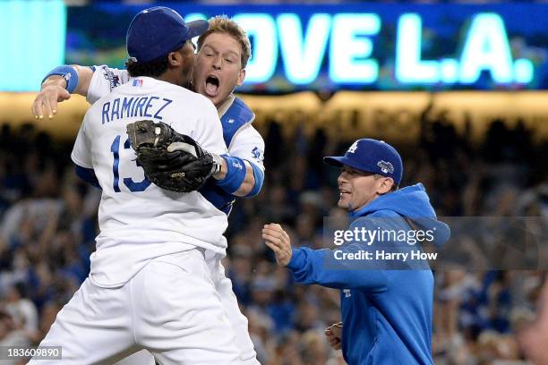 Ellis and Hanley Ramirez of the Los Angeles Dodgers celebrate after the Dodgers defeat the Atlanta Braves 4-3 in Game Four of the National League...