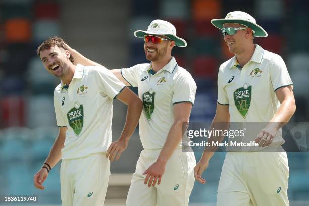 Jordan Buckingham of the Prime Ministers XI celebrates taking the wicket of Aamir Jamal of Pakistan during day two of the Tour Match between PMs XI...