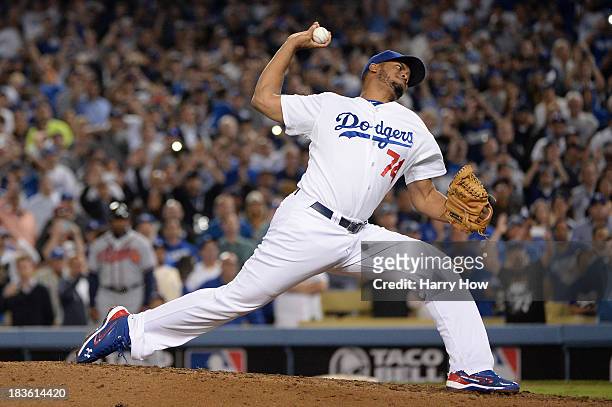 Kenley Jansen of the Los Angeles Dodgers pitches in the ninth inning against the Atlanta Braves in Game Four of the National League Division Series...