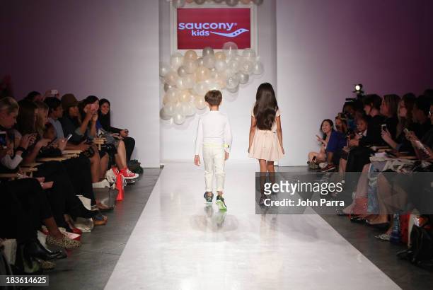 Model walk the runway at the Saucony Kids preview during the Stride Rite Show at the petiteParade NY Kids Fashion Week in Collaboration with...