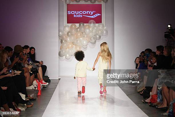Model walk the runway at the Saucony Kids preview during the Stride Rite Show at the petiteParade NY Kids Fashion Week in Collaboration with...