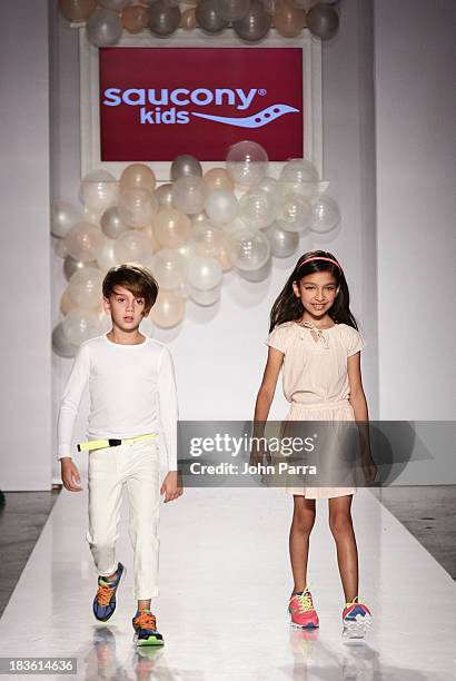 Model walk the runway at the Saucony Kids preview during the Stride Rite Show at the petiteParade NY Kids Fashion Week in Collaboration with...