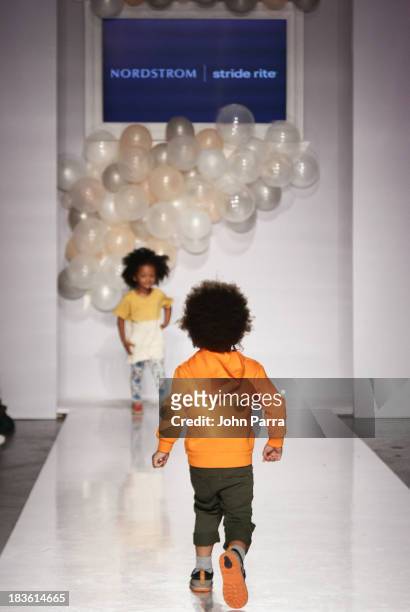 Model walk the runway at the Nordstrom Stride Rite Show during the petiteParade NY Kids Fashion Week in Collaboration with VOGUEbambini at Industria...