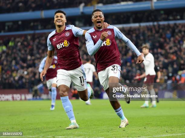 Leon Bailey of Aston Villa celebrates after scoring the team's first goal during the Premier League match between Aston Villa and Manchester City at...