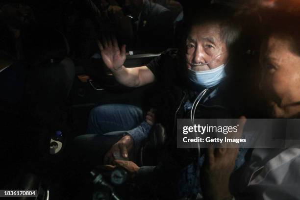 Former president of Peru Alberto Fujimori exits in a car the Barbadillo prison after being released on December 06, 2023 in Lima, Peru. On Tuesday,...