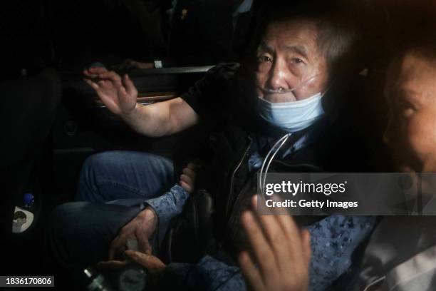 Former president of Peru Alberto Fujimori exits in a car the Barbadillo prison after being released on December 06, 2023 in Lima, Peru. On Tuesday,...